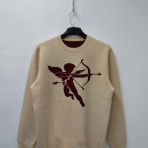 jersey rompido cupido en beige con un cupido en color granate